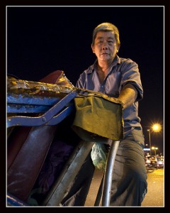 A Trishaw man at HCM night market (ISO400)